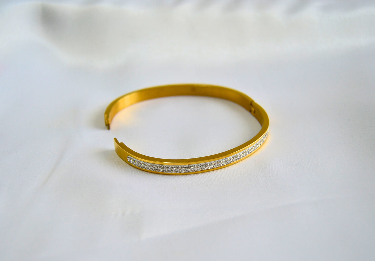 Elegance Classic Gold with Cubic Zirconia insert Bangle