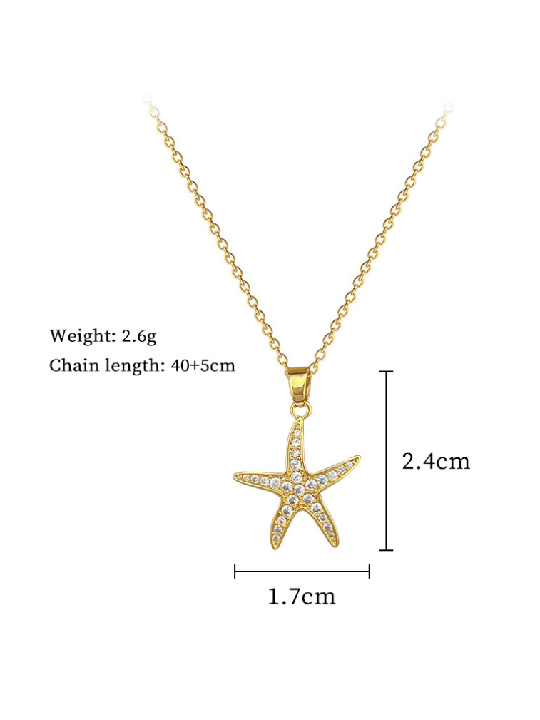 Gold starfish necklace with measurements on a white background